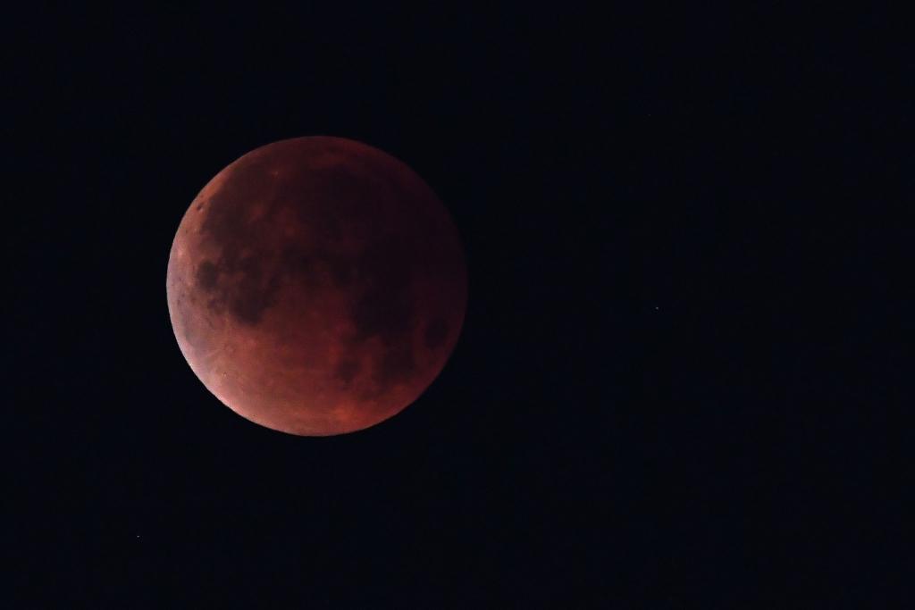 Starts With A Rare Cosmic Event: A Total Lunar Eclipse AND A Super Blood Moon